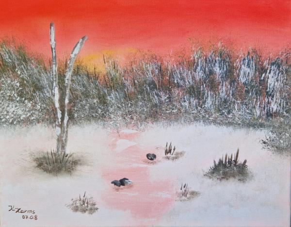 Sonnenaufgang in verschneiter Winterlandschaft